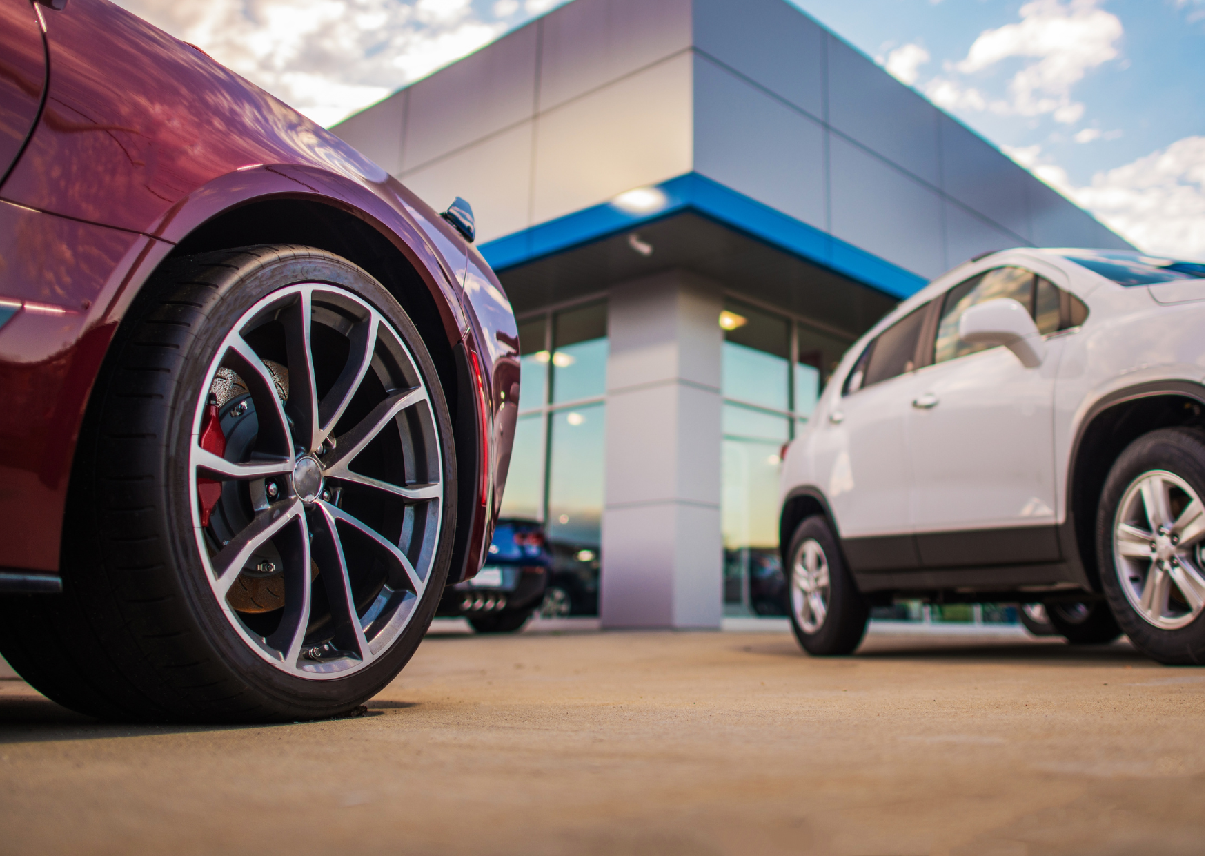 Dealer presenting cars in a premium setting